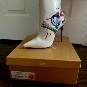 Louboutin boots size 42 fits us 10